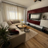 Apartament spațios de 4 camere, 2 băi, terasă și parcare, ideal pentru familie thumb 1