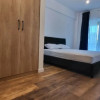 Mută-te direct! 2 camere moderne + loc de parcare inclus în Pallady thumb 4