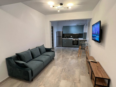 Apartament de 2 camere, 43 mp, parcare, terasa, curte, zona Straulesti 