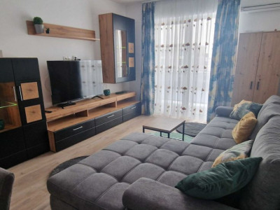 Apartament de 2 camere, 56 mp, 2 parcări, centrala, balcon, La Foresta Tunari